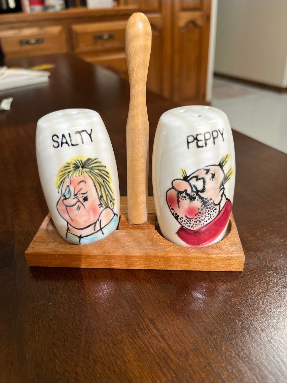 Vintage salty and peppy shakers